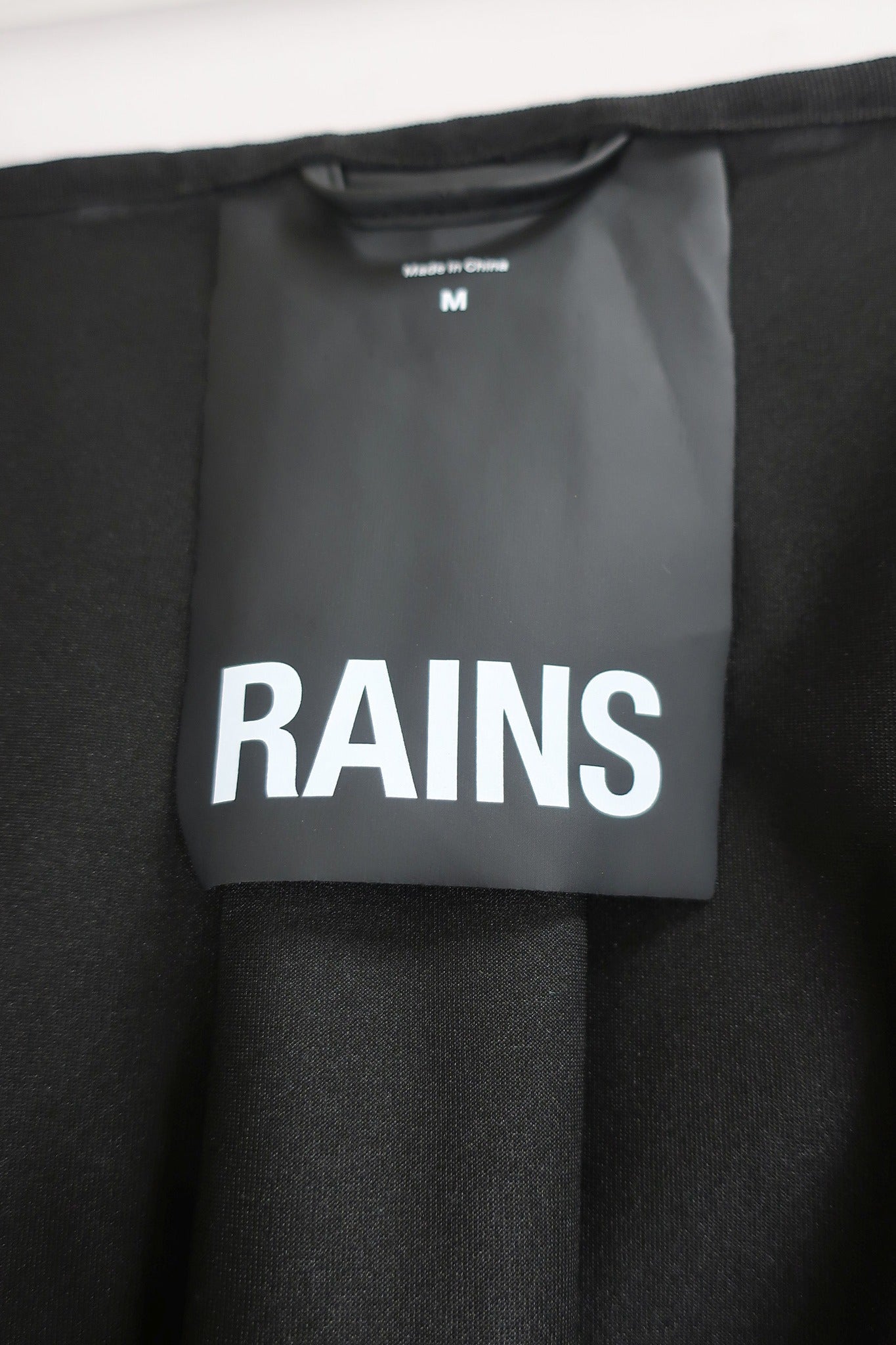 RAINS moteriškas lietpaltis M dydis