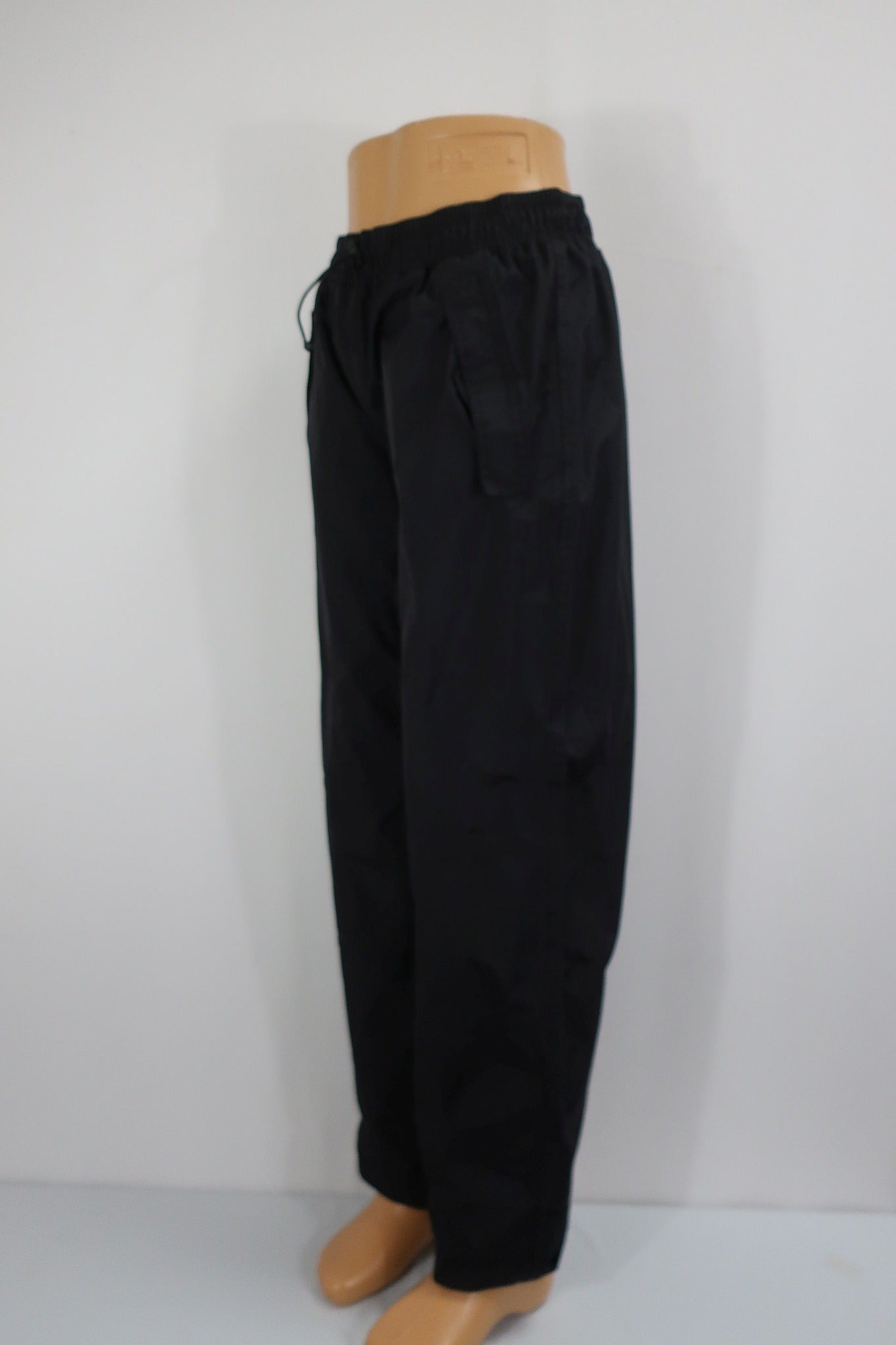 CRAFT vyriškos neperšlampančios laisvalaikio kelnės M dydis.