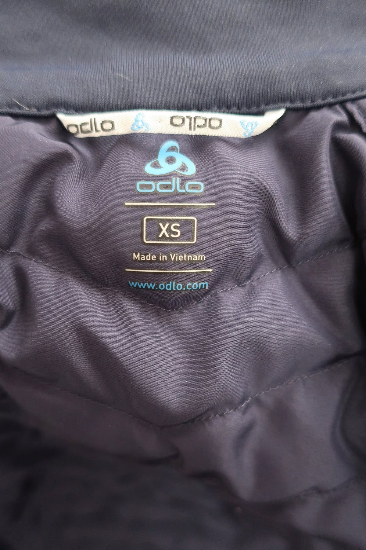 ODLO moteriška lengva pūkinė striukė/šiltukas XS dydis