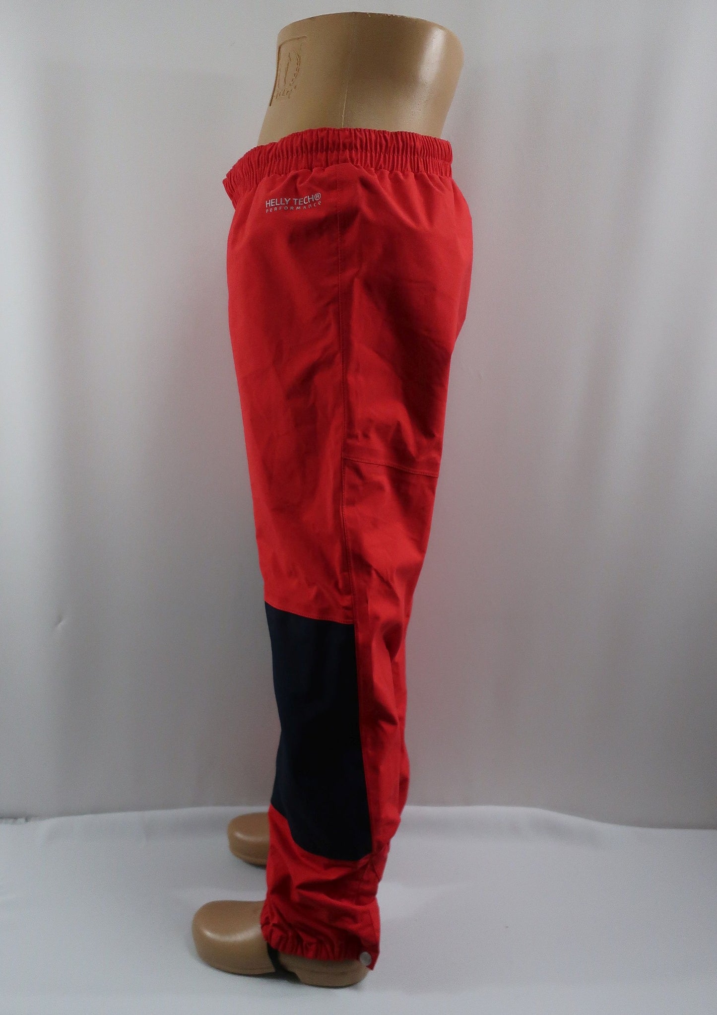 HELLY HANSEN vaikiškos neperšlampančios membraninės laisvalaikio kelnės 134 ūgiui.