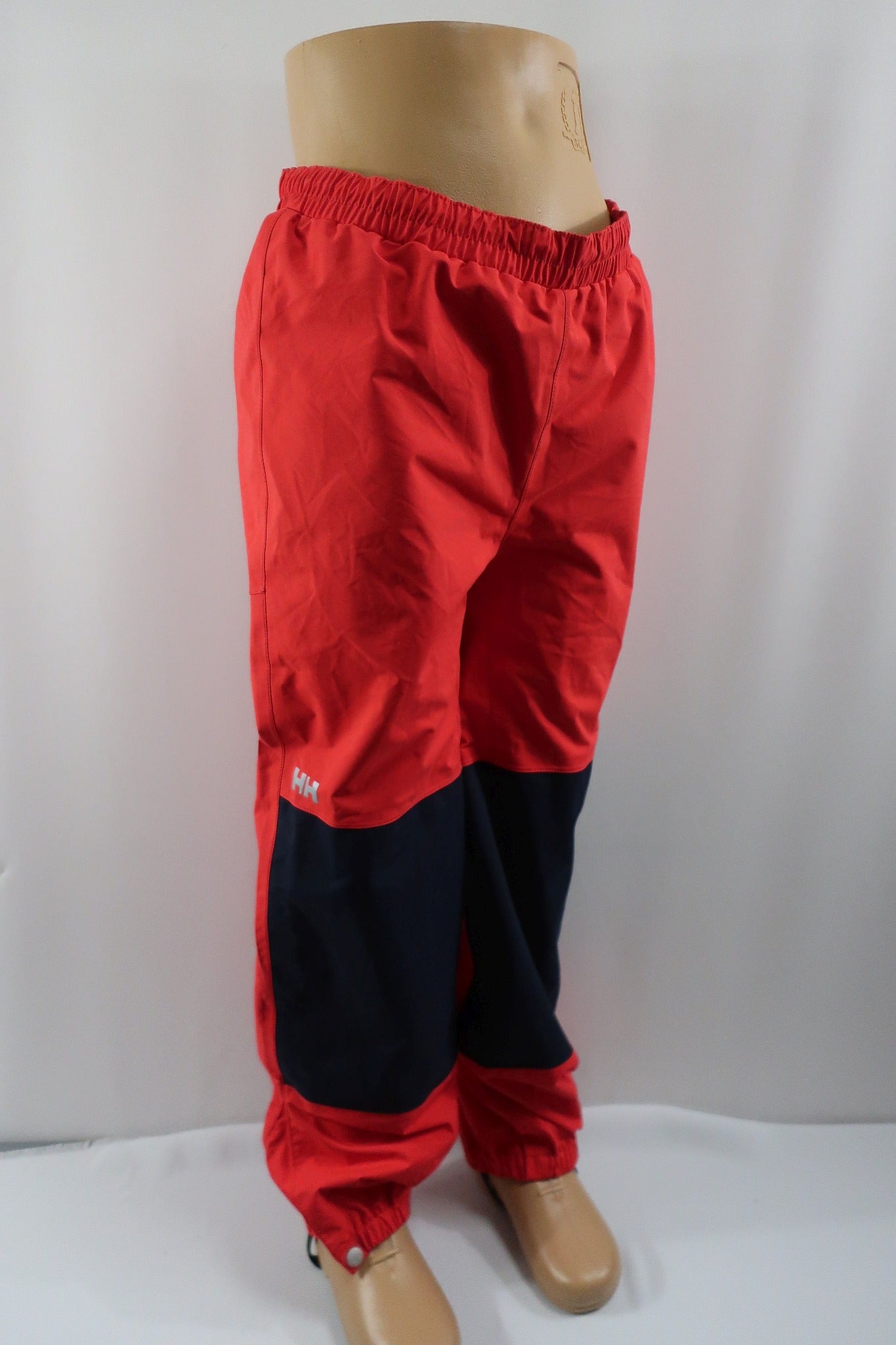 HELLY HANSEN vaikiškos neperšlampančios membraninės laisvalaikio kelnės 134 ūgiui.