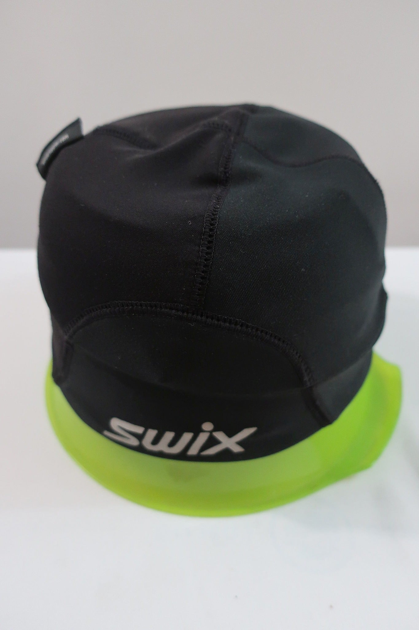SWIX vaikiška windstoperinė sportinė kepurė