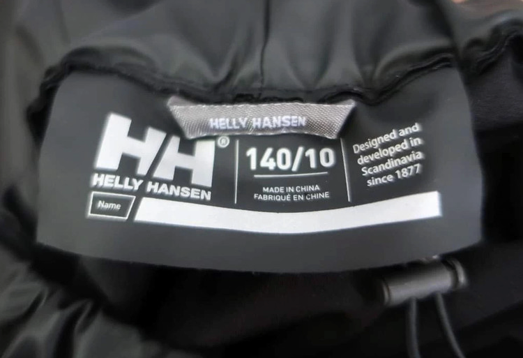 Helly Hansen vaikiškos lietaus neperšlampančios, laisvalaikio kelnės 140 ūgiui