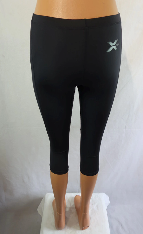 2XU moteriškos sportinės tamprės/ilgi šortai M dydis