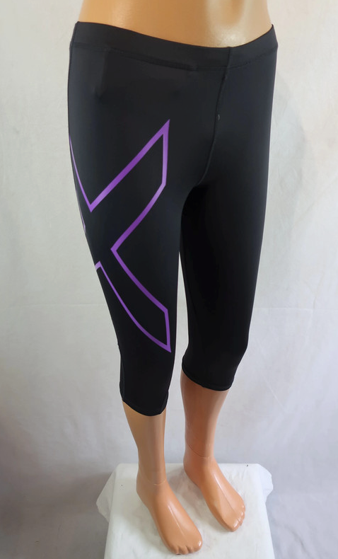 2XU moteriškos sportinės tamprės/ilgi šortai M dydis